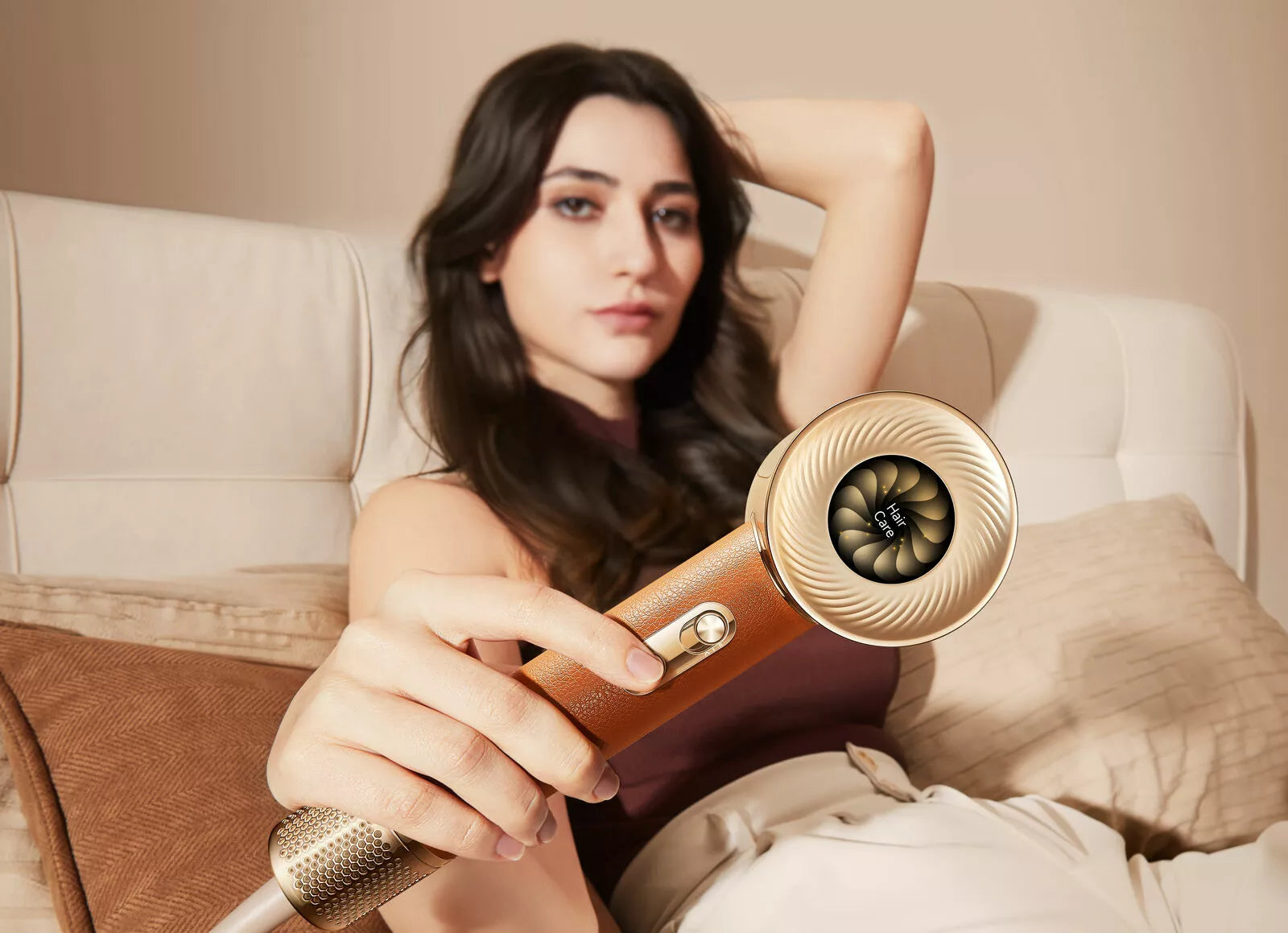 Dreame Hair Glory dryer in Hair Care mode held by woman