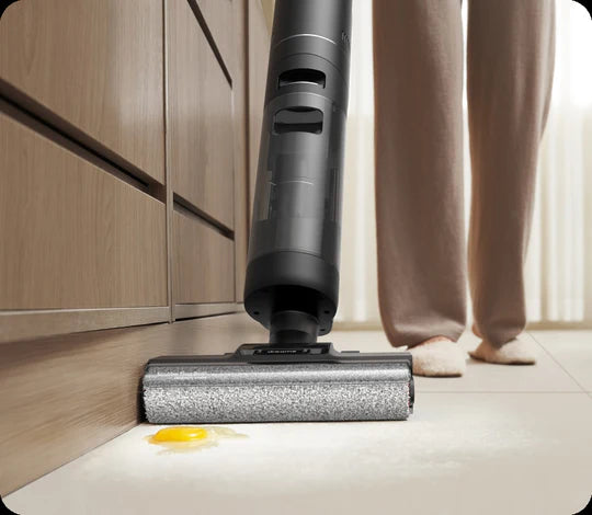 Dreame H12 Pro wet and dry vacuum cleaning up spilled egg